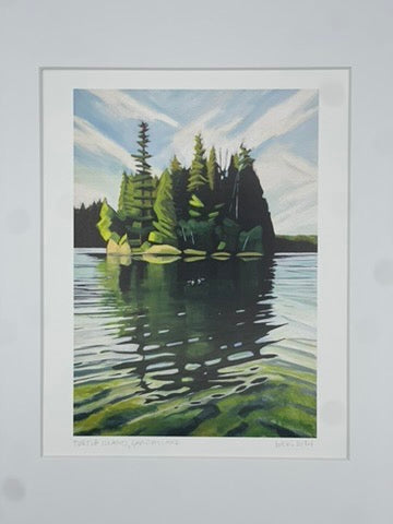 Framed painting of a serene lake with trees