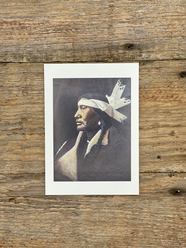 Vintage-style portrait of an indigenous Canadian on a wooden surface