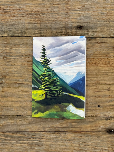 Painting of a tree on a wooden surface