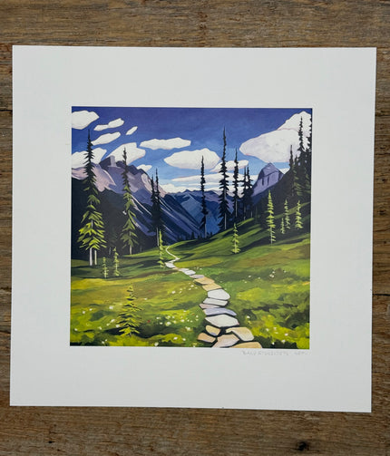 Painting of a mountain landscape with a stone path on a wooden surface