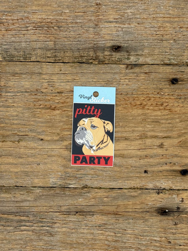 Sticker with a dog design and text on a wooden surface