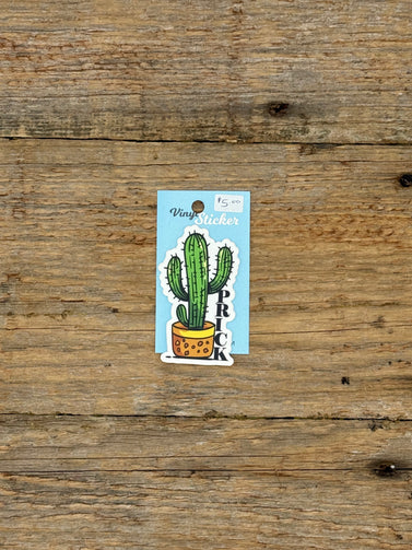 Cactus-shaped vinyl sticker on a wooden surface