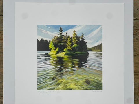 Matted artwork of a forest scene with trees reflected in water.