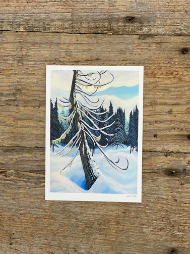 Winter scene greeting card on a wooden surface