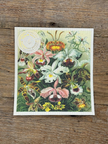 Decorative cloth with floral design on a wooden surface