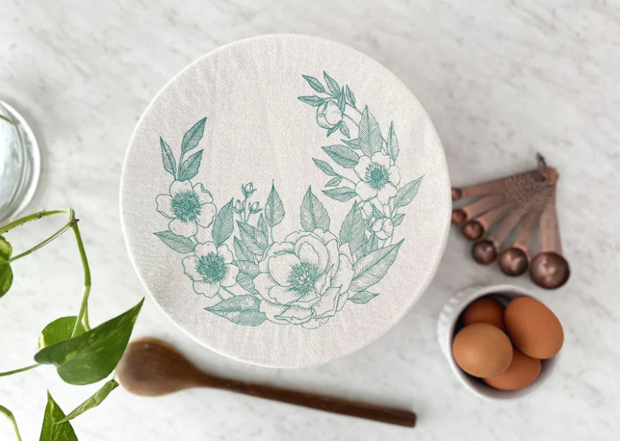 white with green floral bowl cover