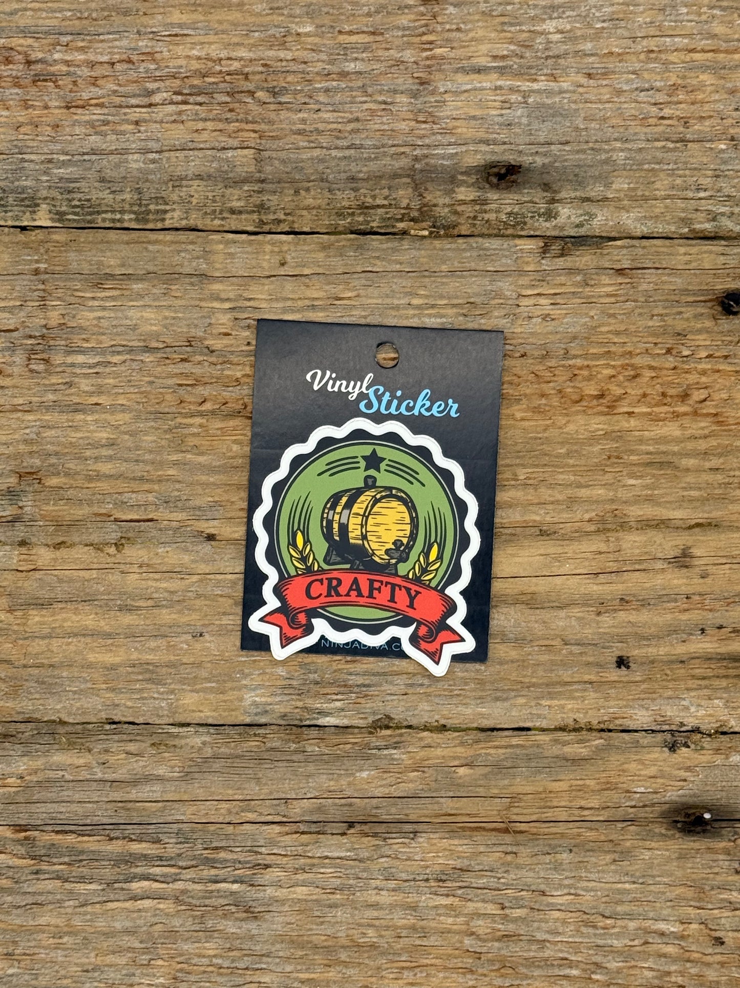 Vinyl sticker with a design on a wooden surface