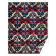 Fleece blanket with indigenous designs on it