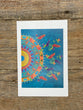 Colorful mandala design on a wooden surface