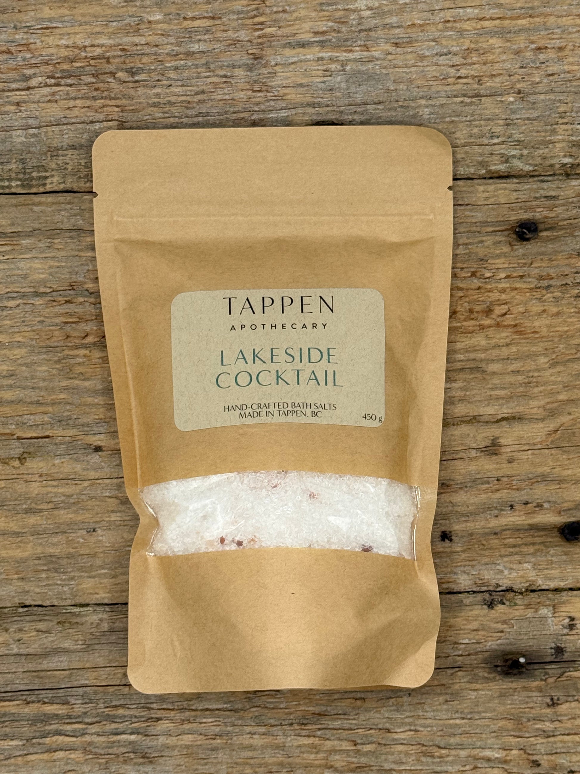 Kraft paper packaging of Tappen Apothecary Lakeside Cocktail on a wooden surface