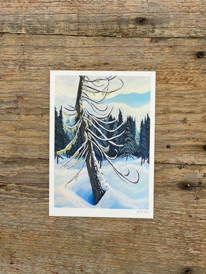 Winter scene greeting card on a wooden surface