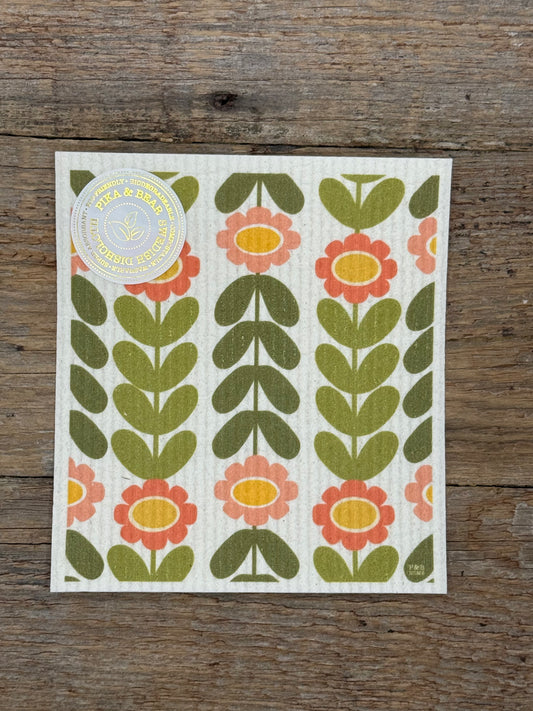 Floral patterned cloth on a wooden surface